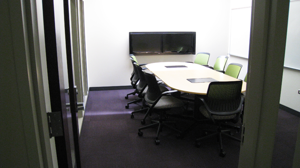 Conference table and dual monitors